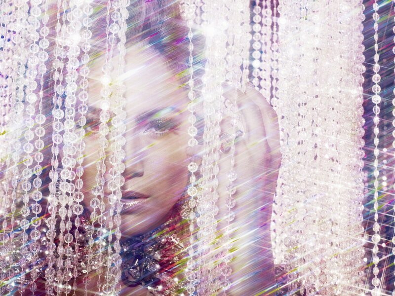 woman behind crystal beads