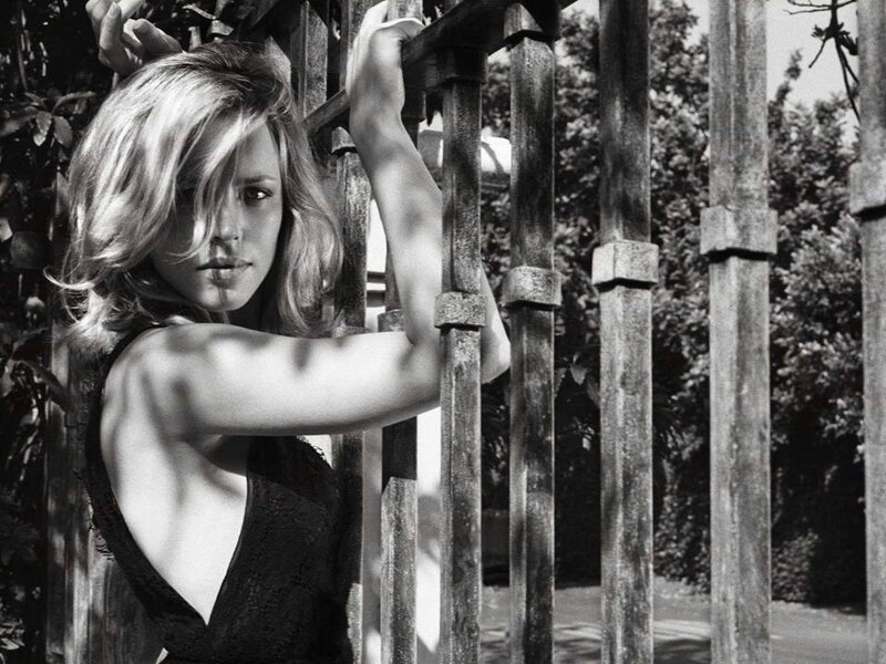 Woman Behind Fence