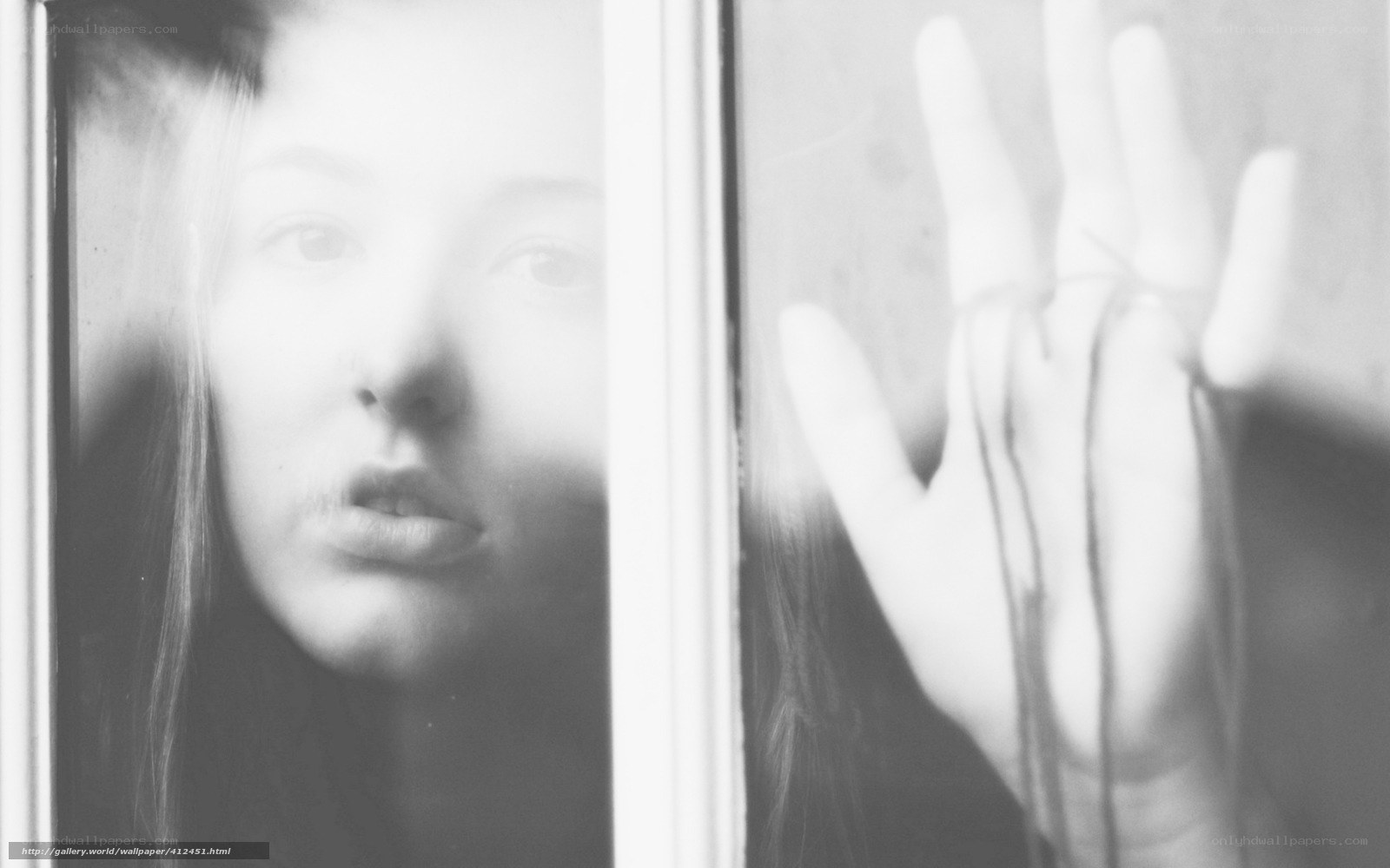 woman behind glass window