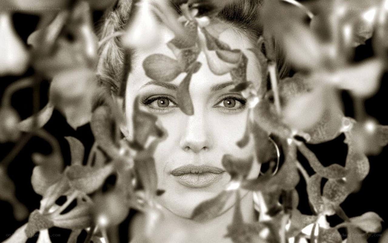 woman behind leaves