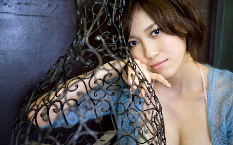 Woman Behind Metal Screen