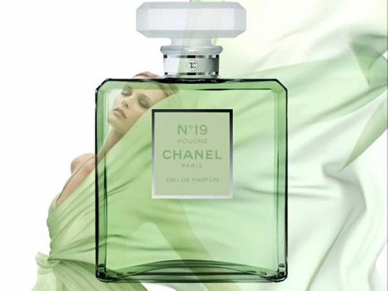 Woman Behind Perfume Bottle