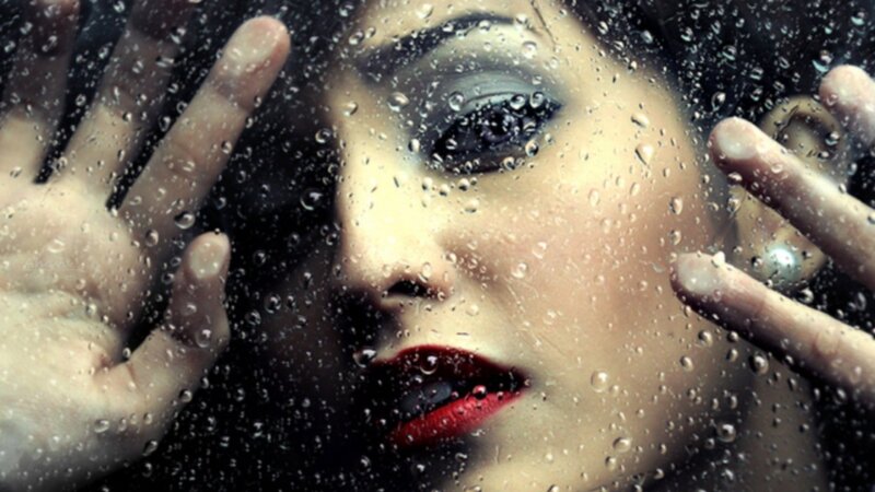 Woman Behind Rain-covered Glass — Black, Dramatic, Photograph, Hands, Raindrops