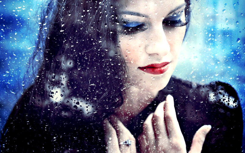Woman Behind Rain-covered Glass — Blue