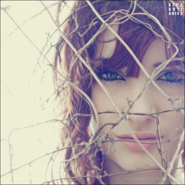 woman behind vines