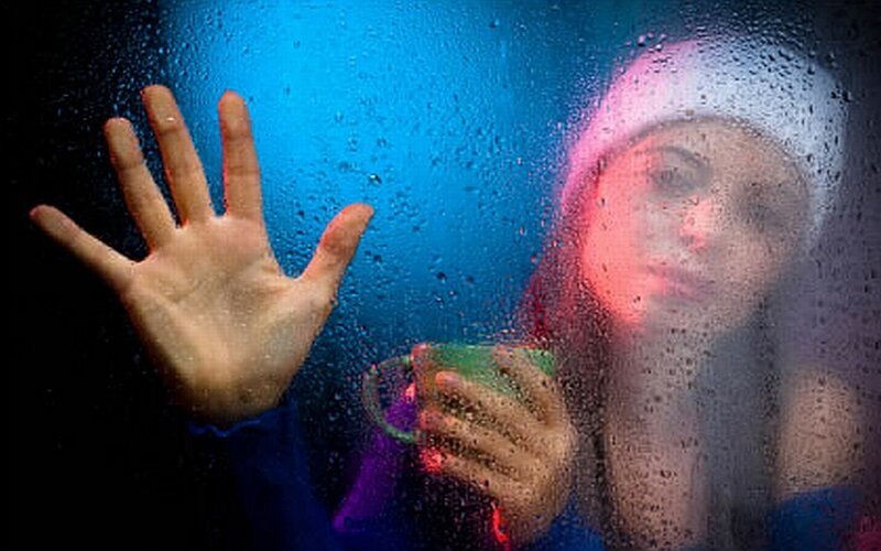 Woman Behind Wet Glass — Blue, Dramatic, Night