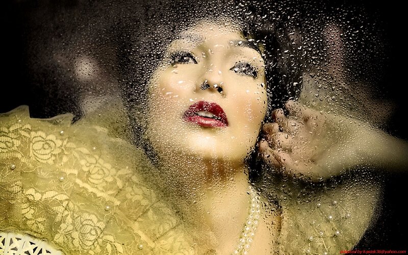 Woman Behind Wet Glass — Gold