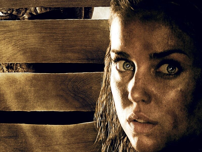 Woman Behind Wooden Slats — Brown