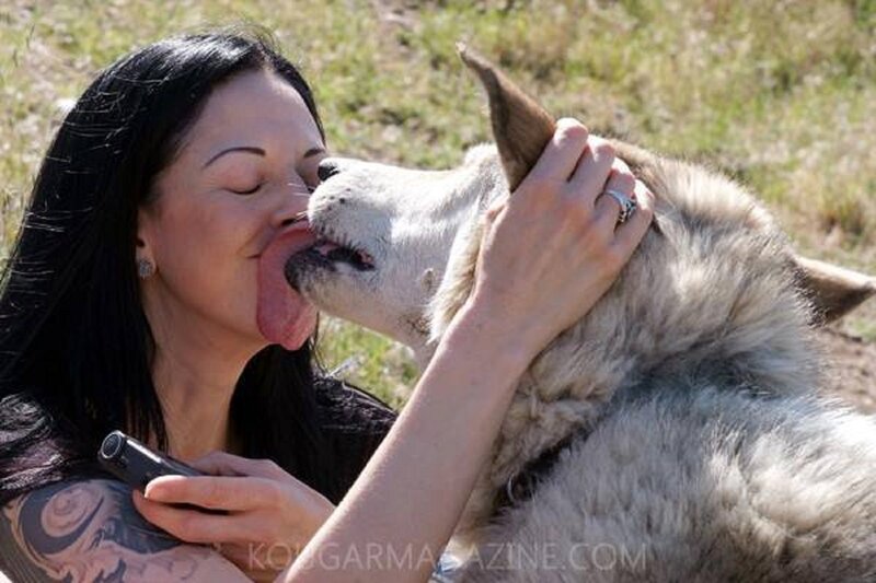 Woman Being Licked by Wolf
