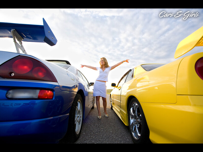 Woman Between Two Cars — Blue, Dramatic