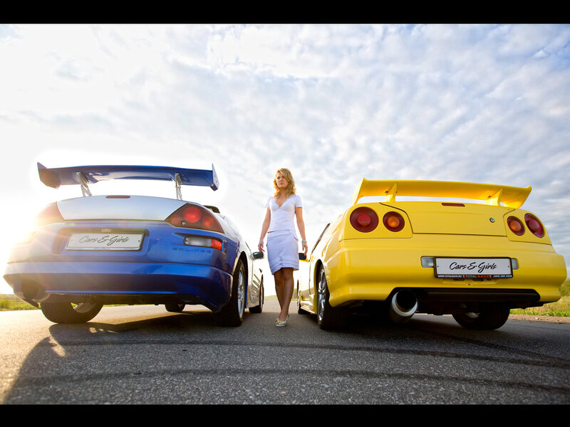 Woman Between Two Cars — Yellow, Dramatic, Afternoon
