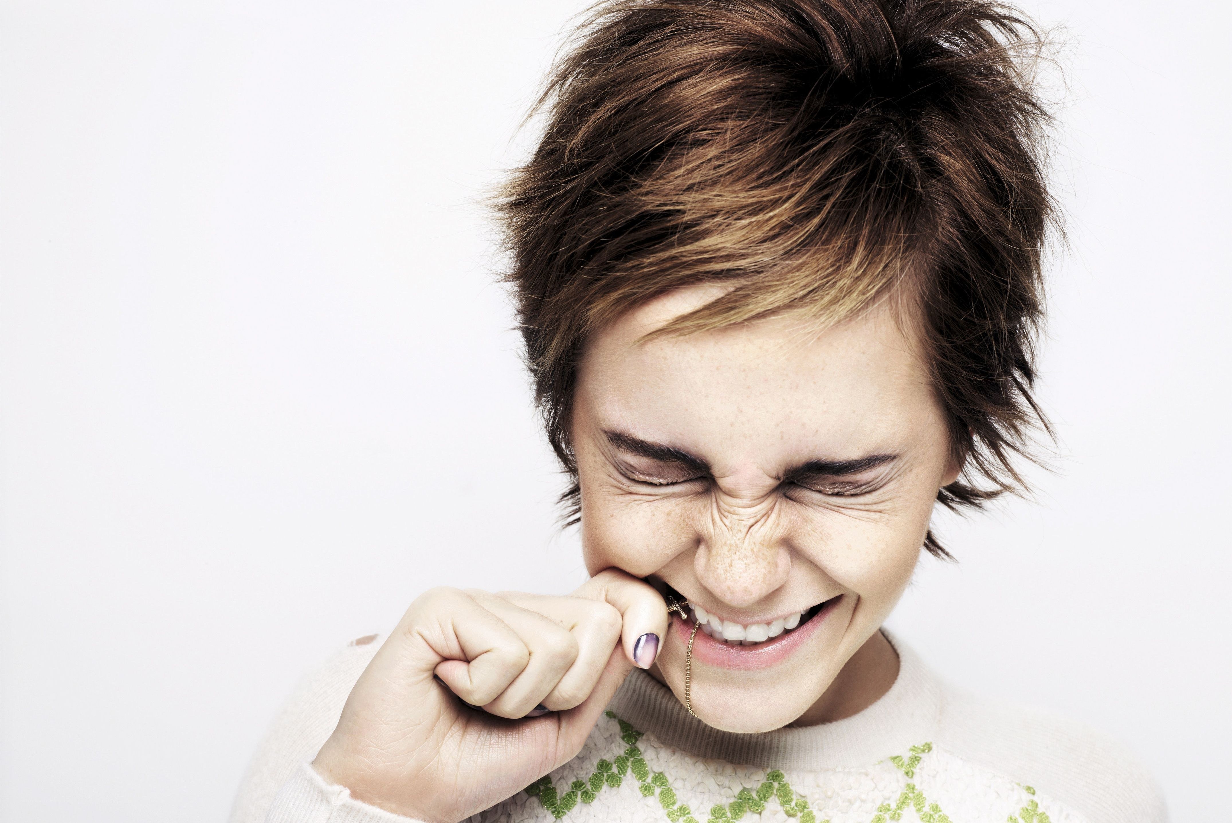 woman biting her hand