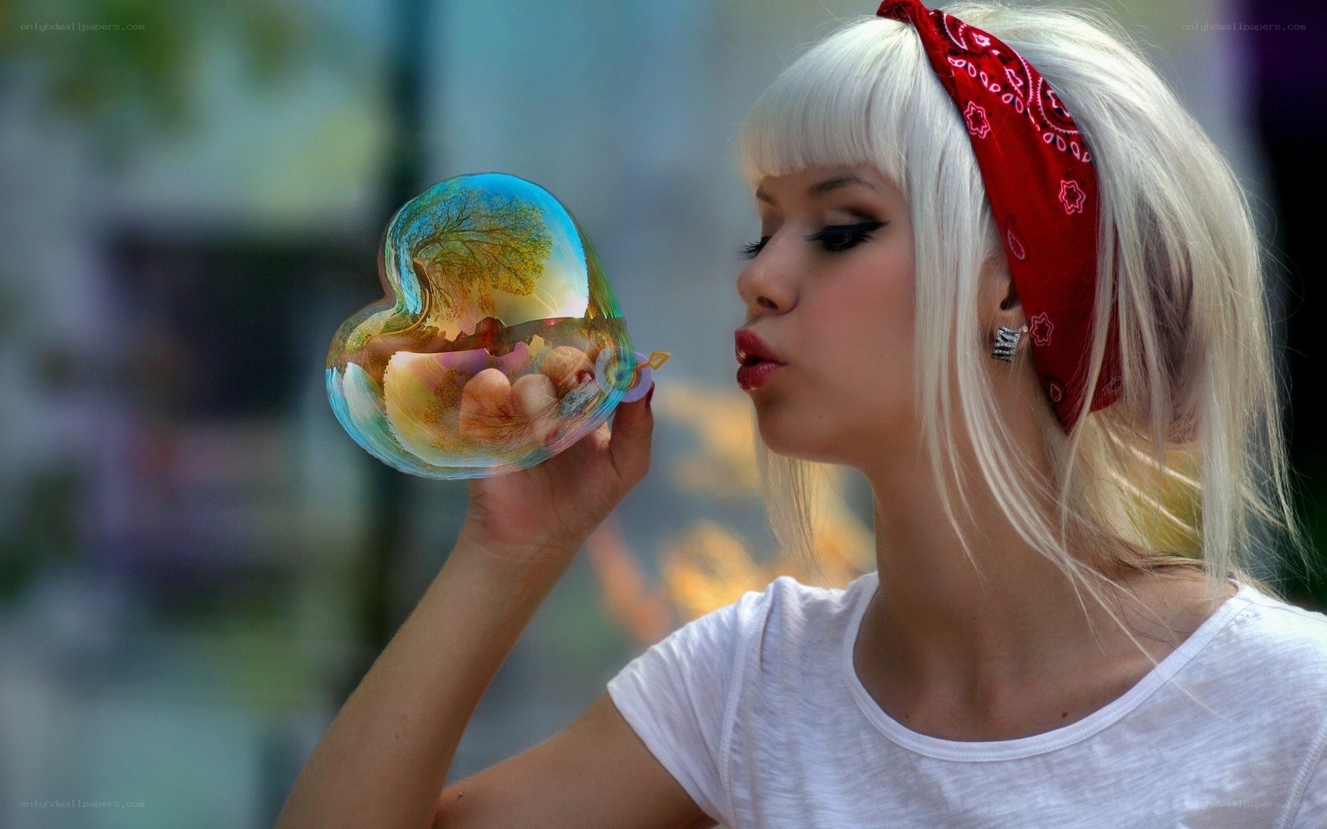 woman blowing a bubble