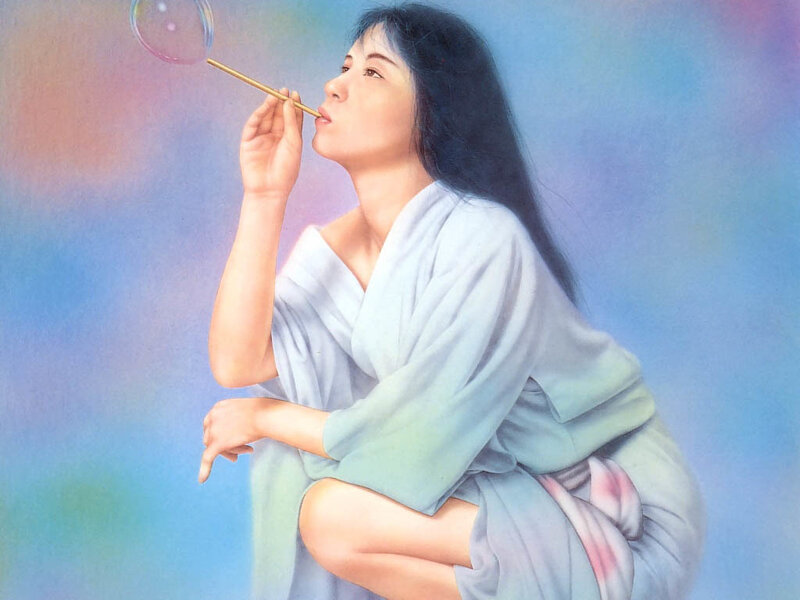 woman blowing a bubble