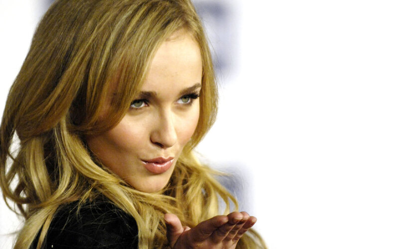 woman blowing a kiss