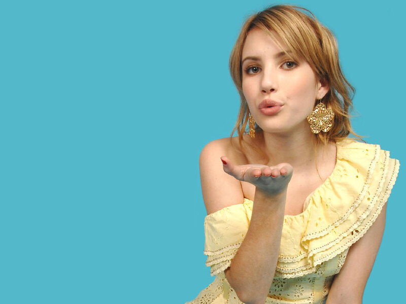 woman blowing a kiss