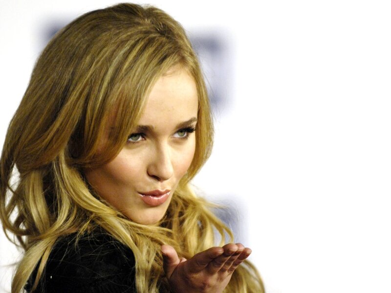 woman blowing a kiss