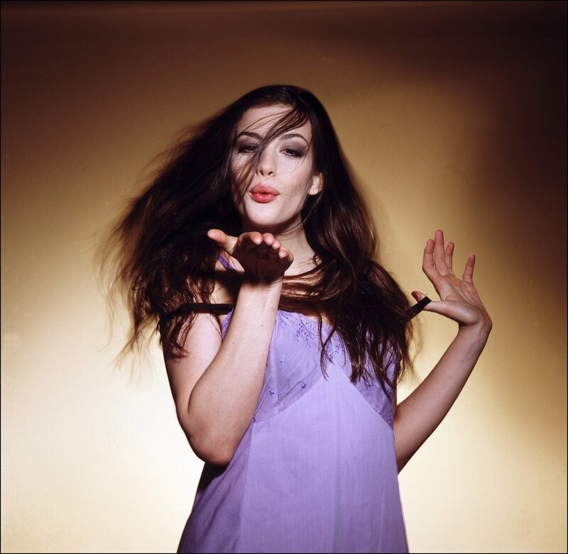 woman blowing a kiss