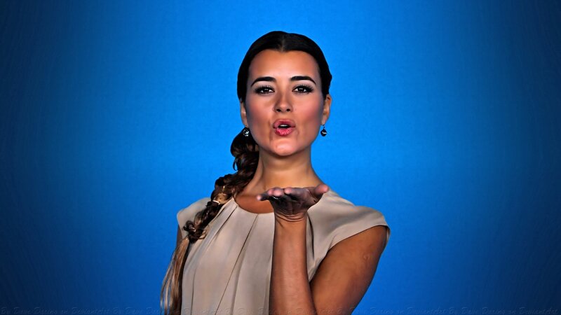 Woman Blowing a Kiss — Blue, Playful, Photograph
