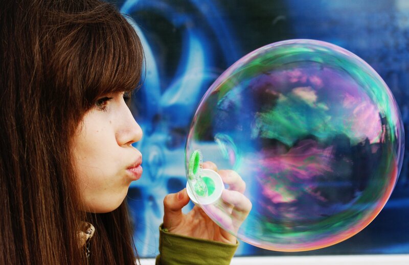 Woman Blowing Bubble — Blue