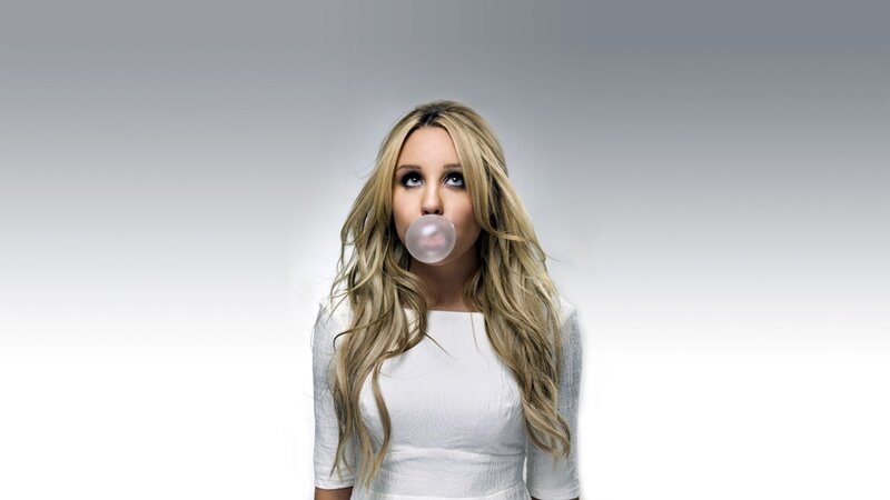 woman blowing bubble gum