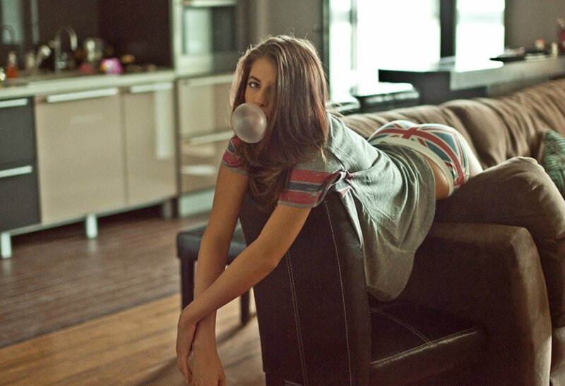 woman blowing bubble gum