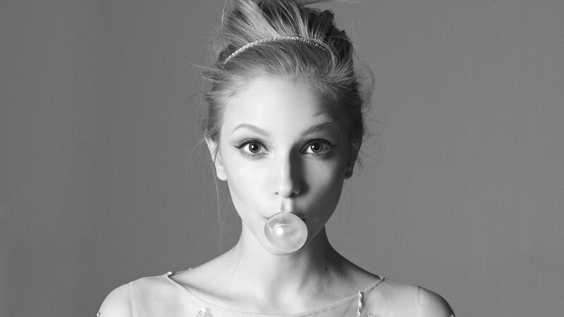 woman blowing bubble gum