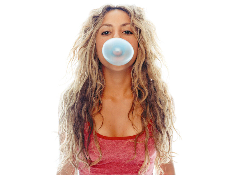 woman blowing bubble gum