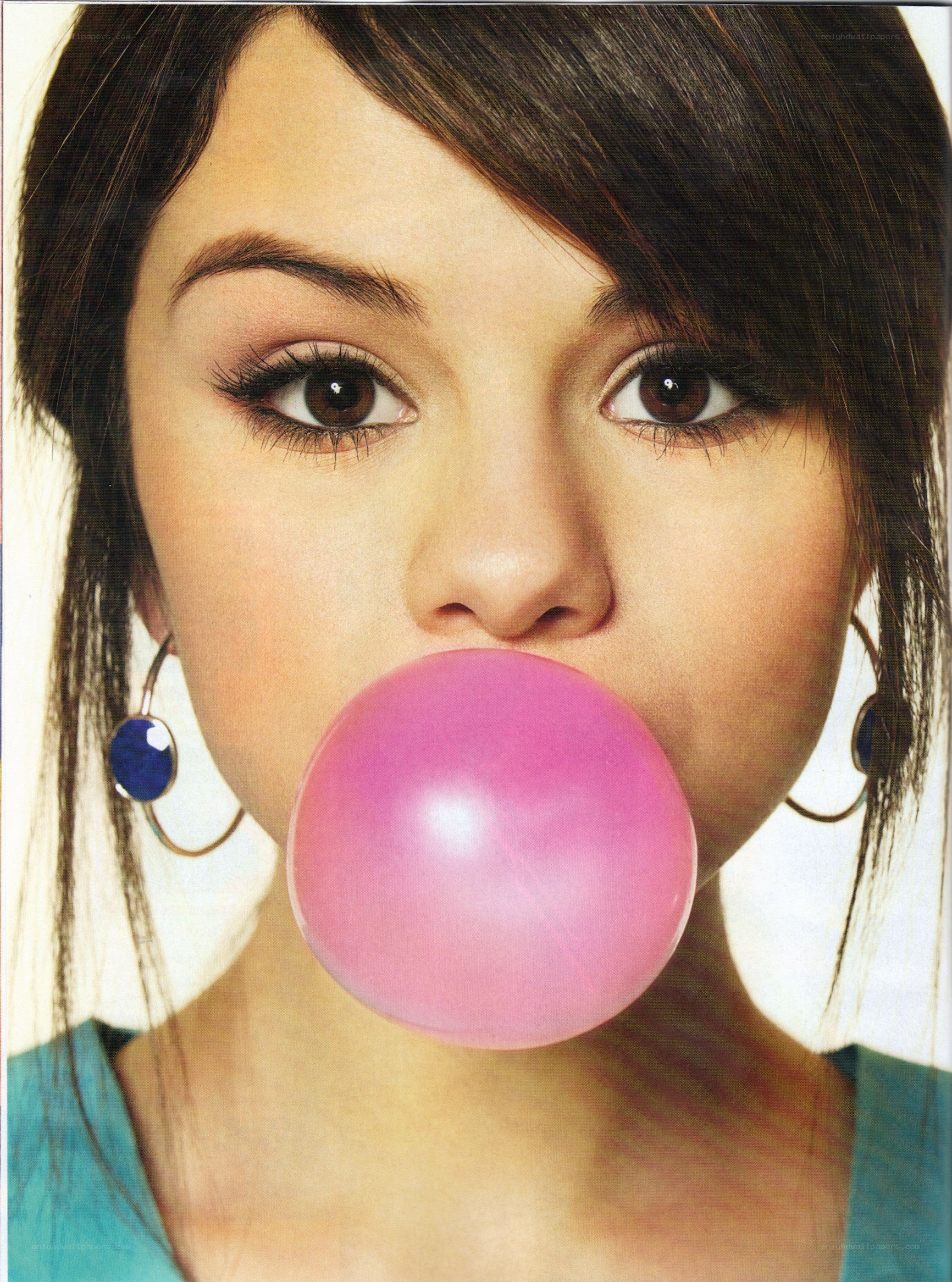 woman blowing bubble gum