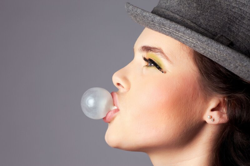 Woman Blowing Bubble Gum — Gray