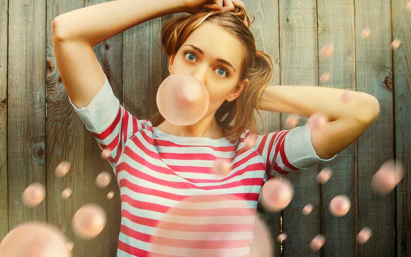 Woman Blowing Bubble Gum — Red, Playful