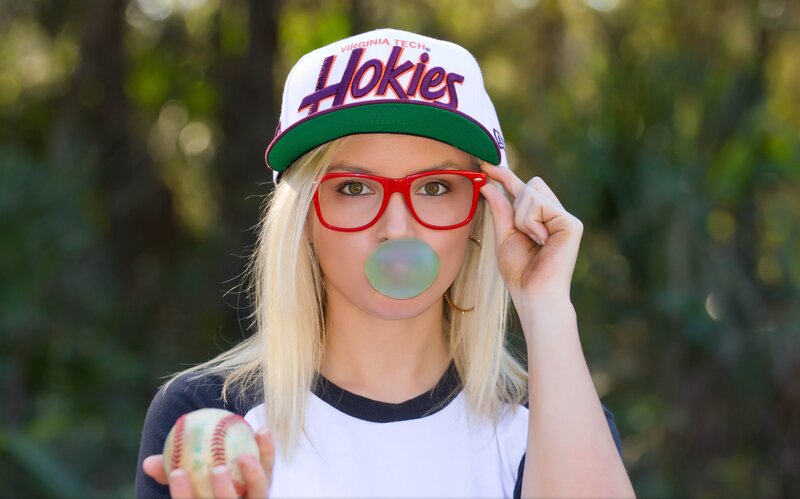 Woman Blowing Bubble Gum — White, Playful, Afternoon, Photograph, Baseball