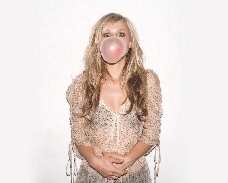 Woman Blowing Bubble Gum — White, Playful