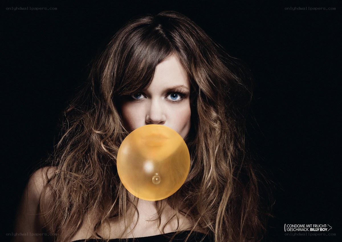woman blowing bubble gum