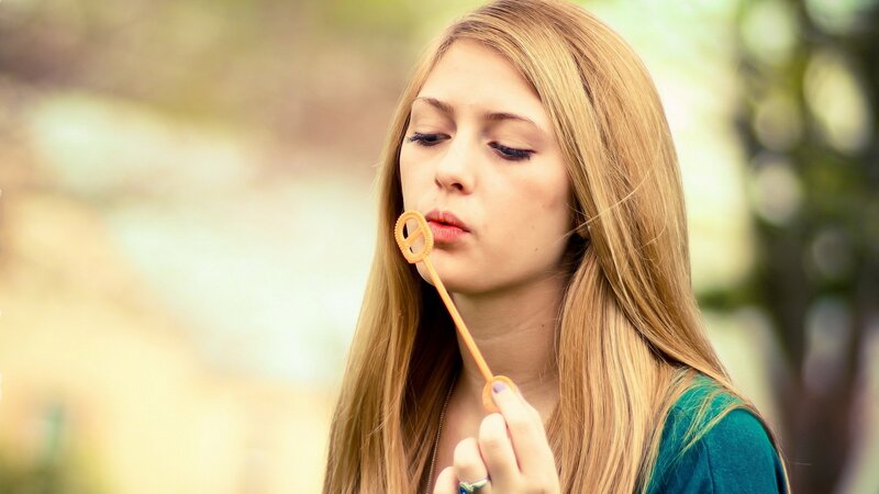 Woman Blowing Bubbles — Blonde, Calm