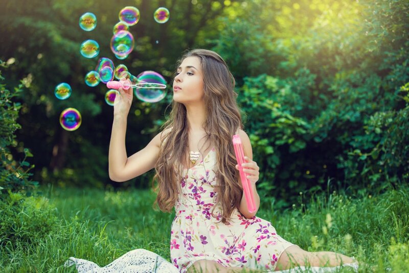 Woman Blowing Bubbles — Green, Serene, Afternoon, Photograph, Dress