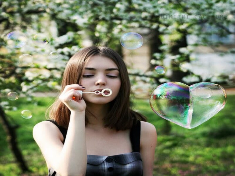 Woman Blowing Bubbles — Green, Serene