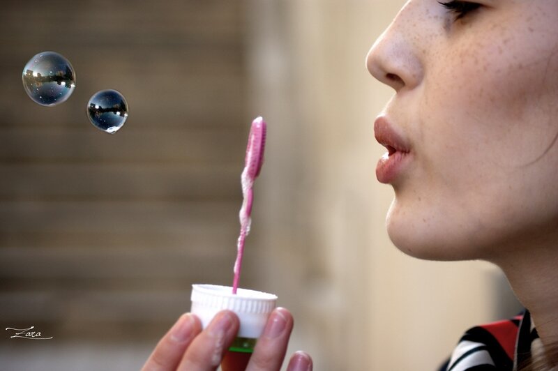 Woman Blowing Bubbles — Pink, Playful, Afternoon, Photograph