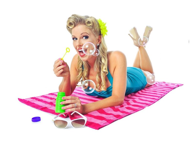 Woman Blowing Bubbles — Pink, Playful