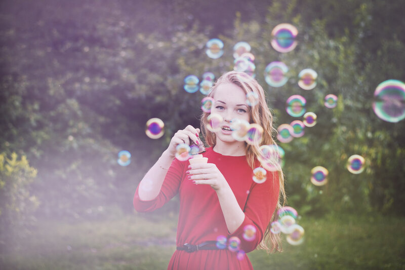 Woman Blowing Bubbles — Red