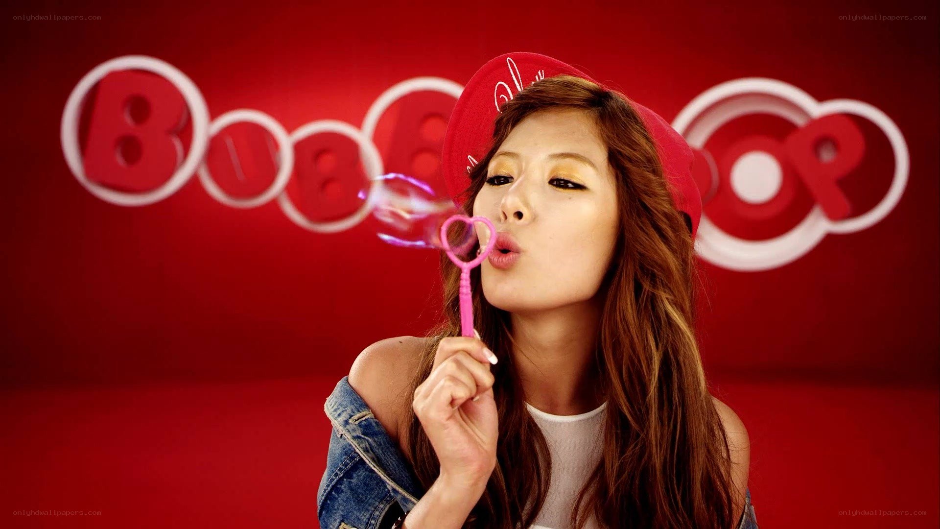 woman blowing bubbles with bubble wand