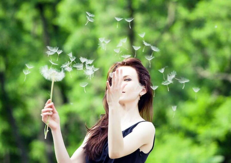 Woman Blowing Dandelion — Green, Serene, Summer