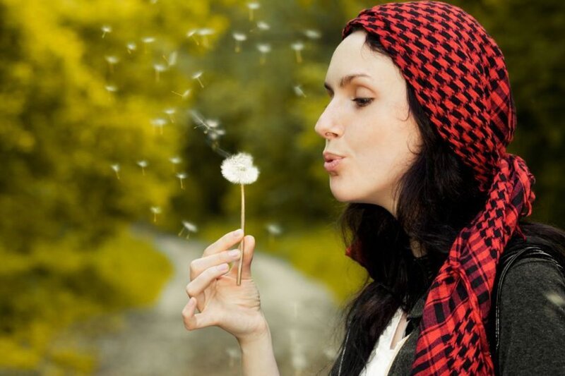 Woman Blowing Dandelion — Red, Serene