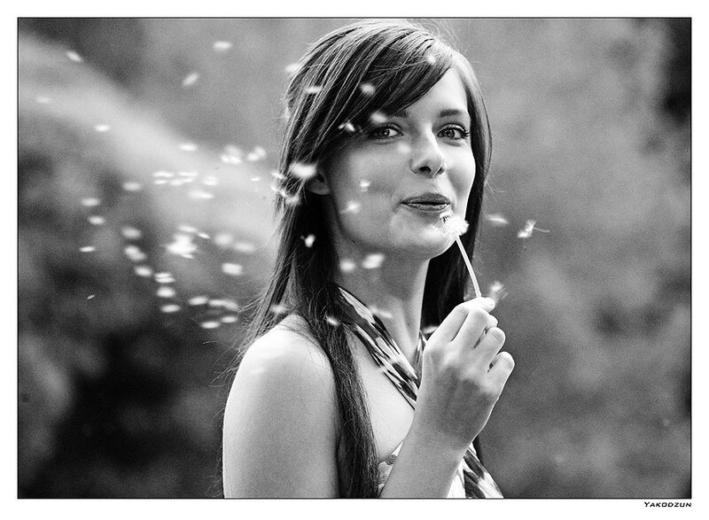 Woman Blowing Dandelion Seeds — Black