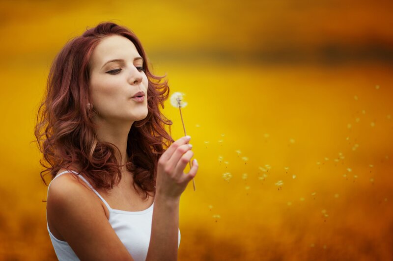 Woman Blowing Dandelion — Yellow
