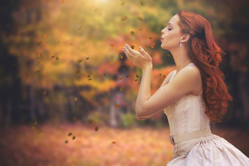 Woman Blowing Leaves — Red