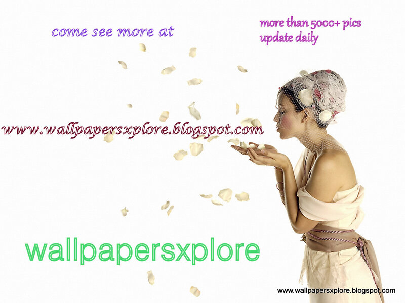 Woman Blowing Petals