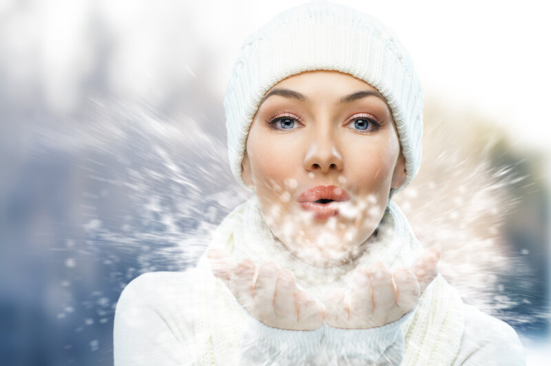 Woman Blowing Snow