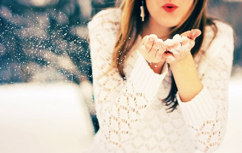 Woman Blowing Snow — White, Playful
