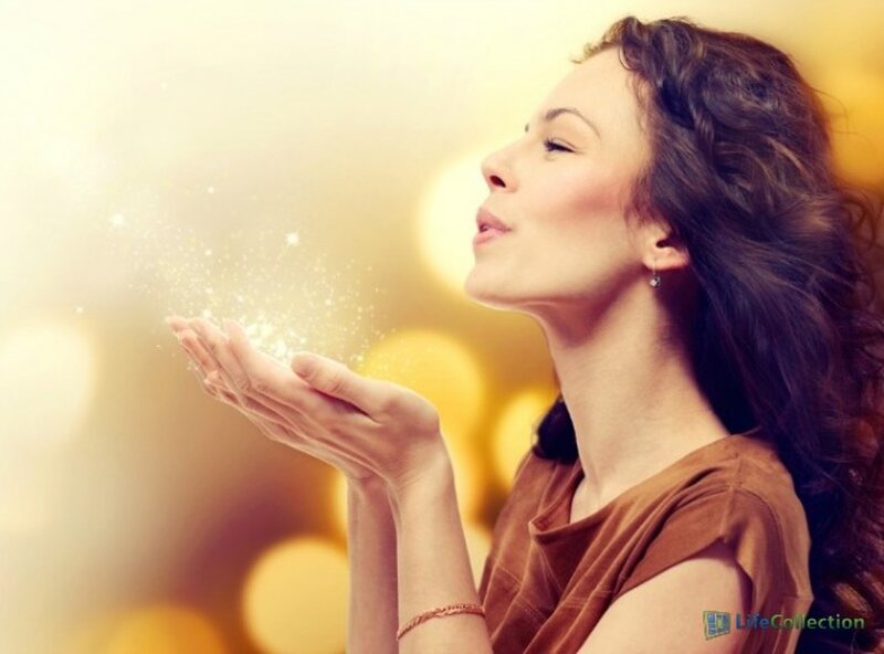 Woman Blowing Sparkles — Gold
